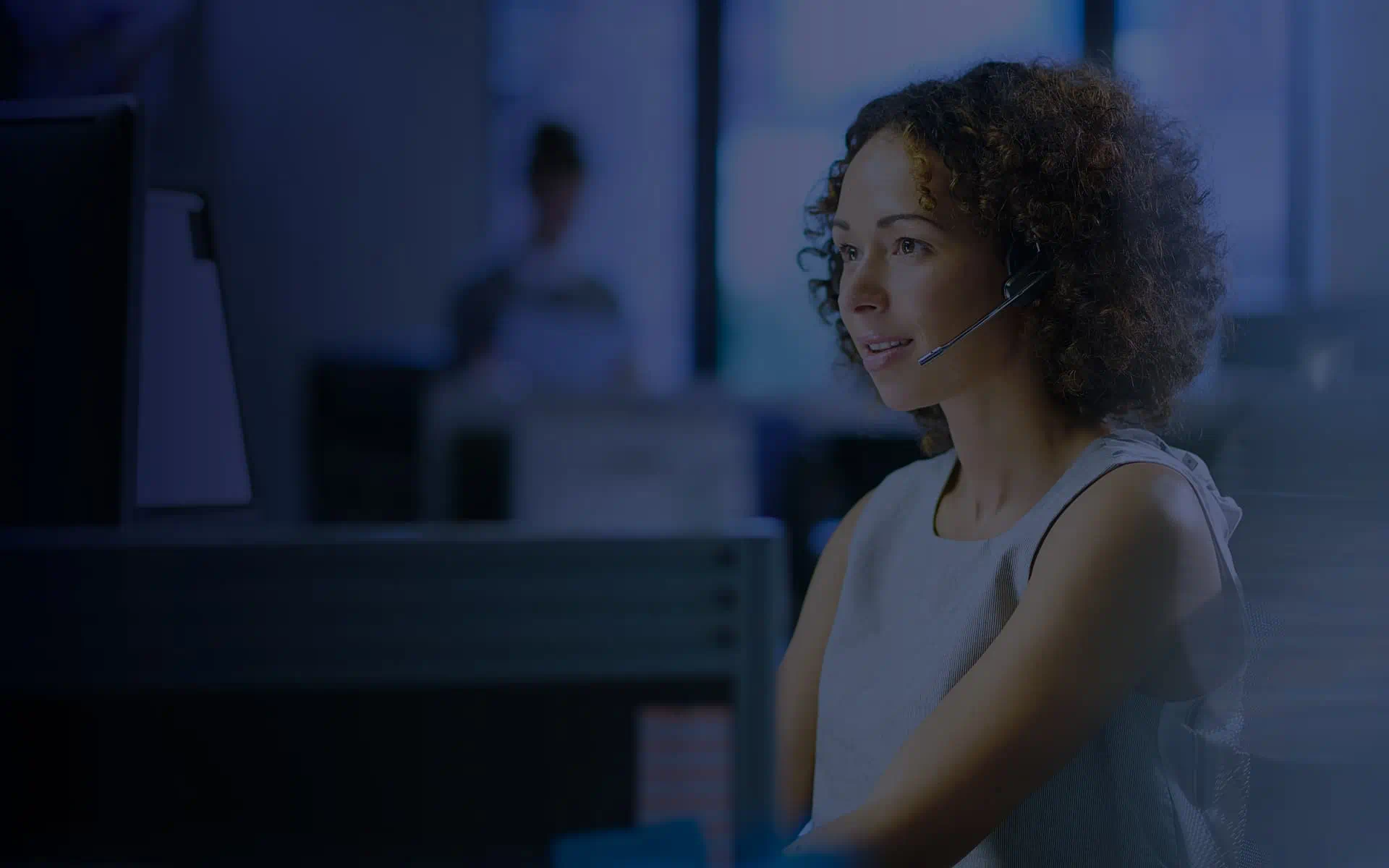 Office worker looking at computer screen